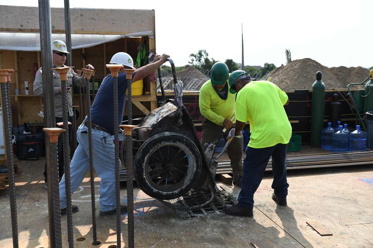 Pouring cement for the outside walls. 